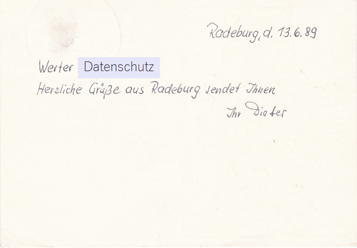 Rückansicht - Postkarte - 700 Jahre Stadt Radeburg, 1989 - Radeburg in Sachsen von 1289-1989 mit Wappen mit Krone auf Postmeilensäule